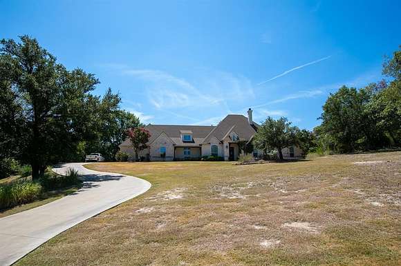 2.461 Acres of Residential Land with Home for Sale in Weatherford, Texas