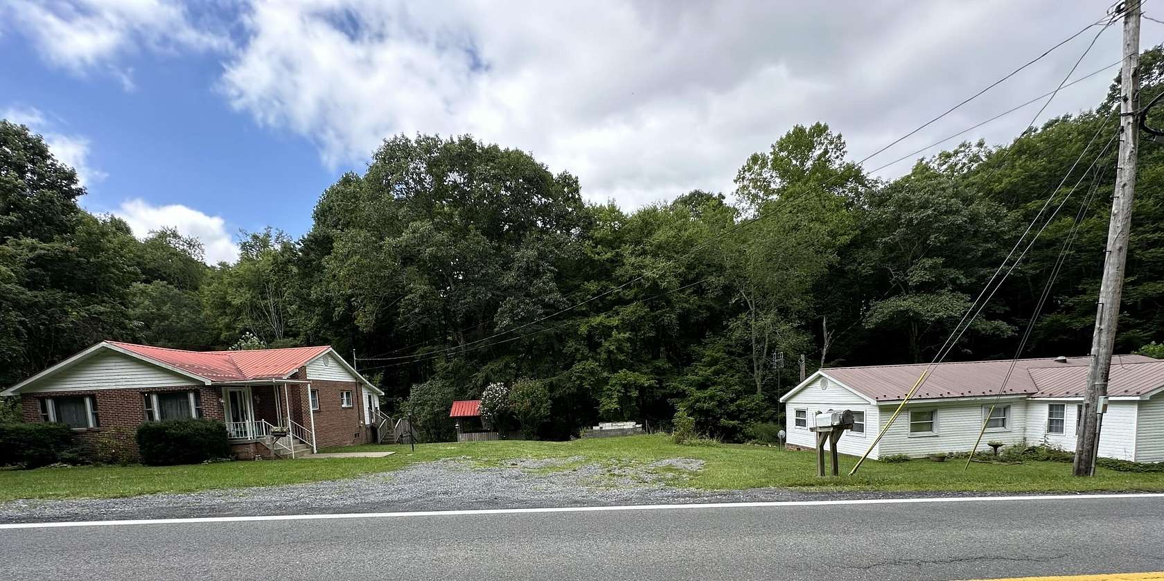 6.5 Acres of Residential Land with Home for Sale in Danese, West Virginia