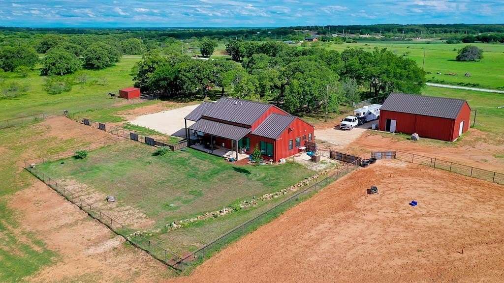 30.87 Acres of Agricultural Land with Home for Sale in Nocona, Texas