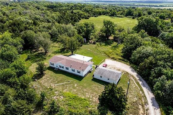 24.85 Acres of Land with Home for Sale in Cherryvale, Kansas