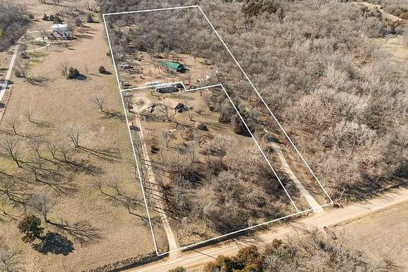 7 Acres of Land with Home for Sale in Coffeyville, Kansas