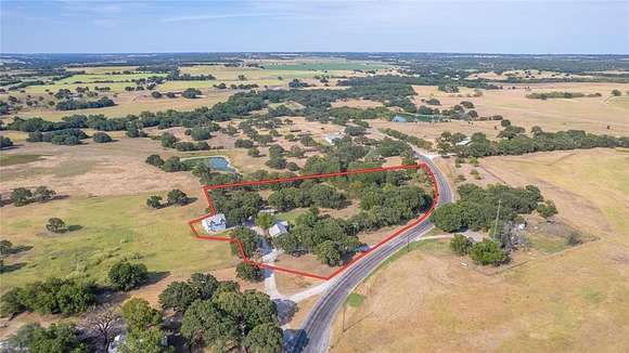 4.9 Acres of Residential Land with Home for Sale in De Leon, Texas