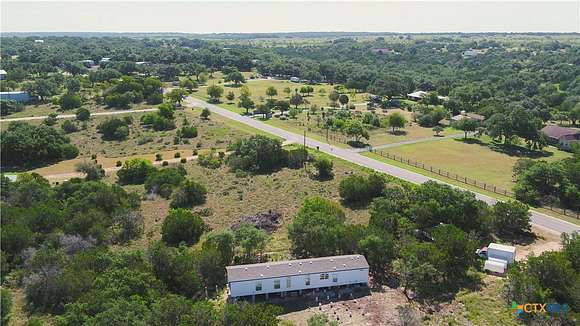 5.05 Acres of Residential Land with Home for Sale in Canyon Lake, Texas