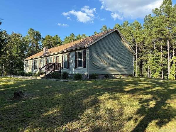 11.4 Acres of Land with Home for Sale in Amity, Arkansas