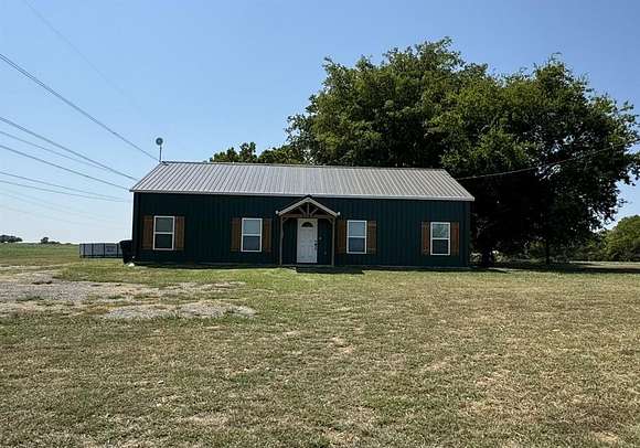 10.24 Acres of Land with Home for Sale in Paris, Texas