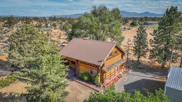 9.9 Acres of Land with Home for Sale in Powell Butte, Oregon