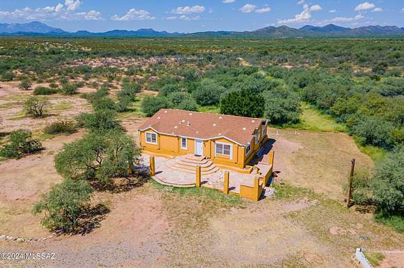 6.97 Acres of Land with Home for Sale in Tucson, Arizona