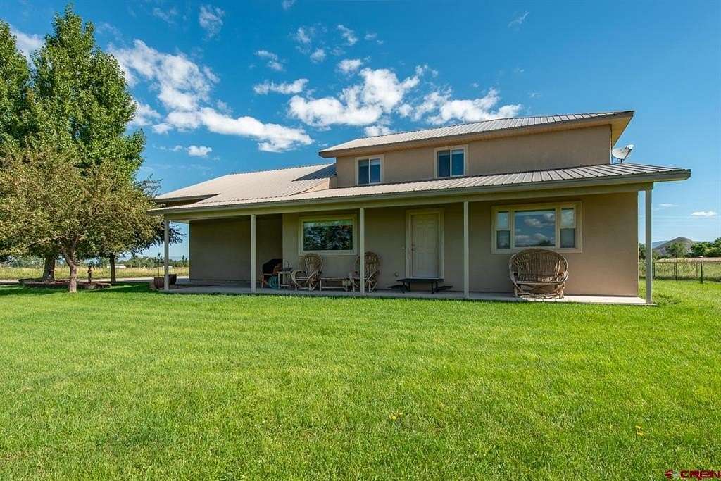 10.66 Acres of Land with Home for Sale in Montrose, Colorado