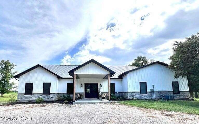 13.51 Acres of Land with Home for Sale in Auxvasse, Missouri