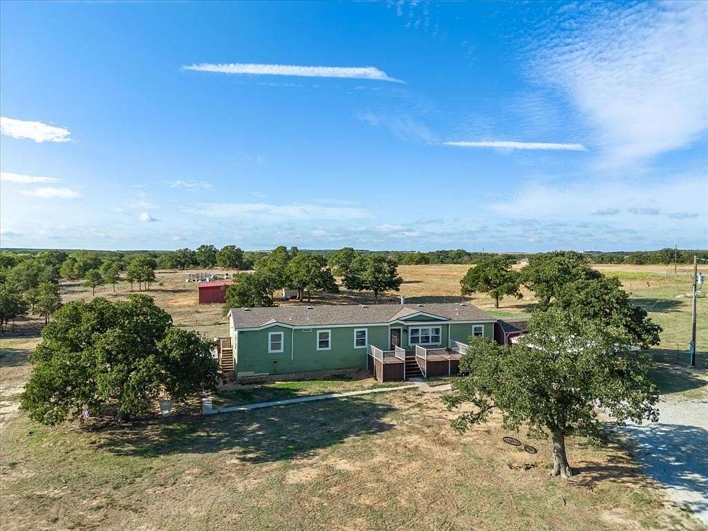 26.54 Acres of Agricultural Land with Home for Sale in Bellevue, Texas