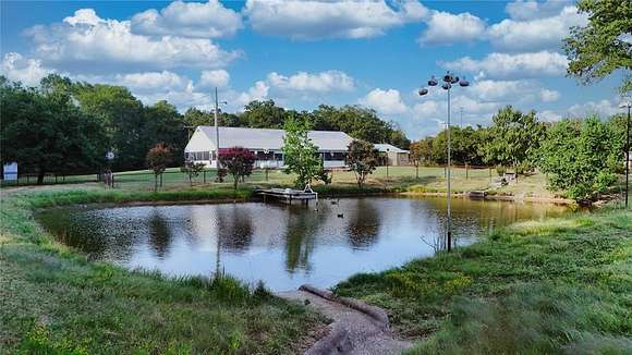 5.83 Acres of Land with Home for Sale in Gun Barrel City, Texas