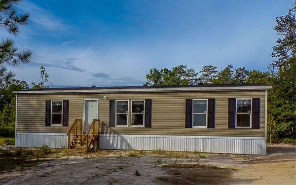 10 Acres of Land with Home for Sale in Lake City, Florida