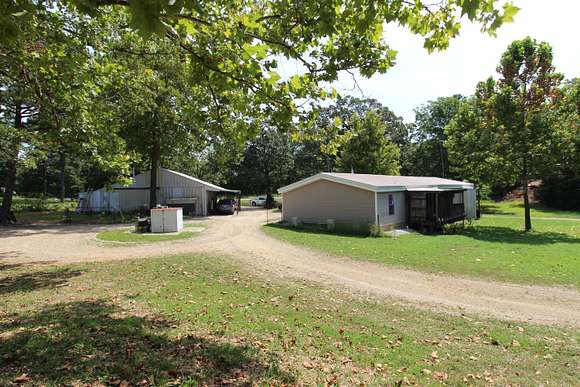 2.8 Acres of Residential Land with Home for Sale in Caulfield, Missouri