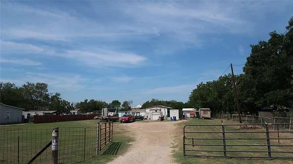 1.442 Acres of Residential Land with Home for Sale in Balch Springs, Texas