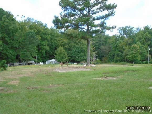 9.42 Acres of Land with Home for Sale in Broadway, North Carolina