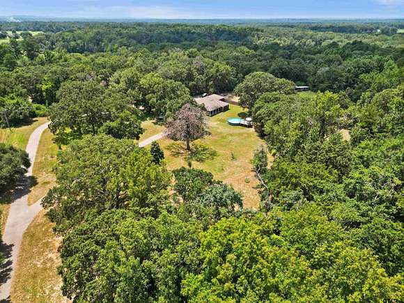 16.71 Acres of Land with Home for Sale in Lindale, Texas