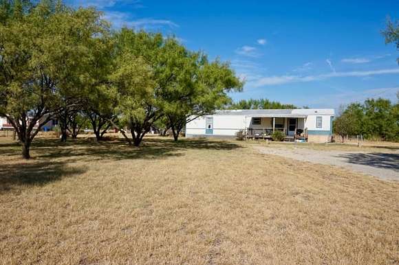 3 Acres of Residential Land with Home for Sale in Iowa Park, Texas