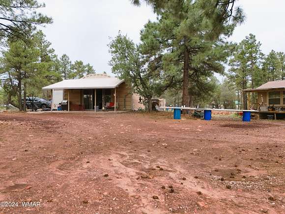 4.37 Acres of Residential Land with Home for Sale in Show Low, Arizona