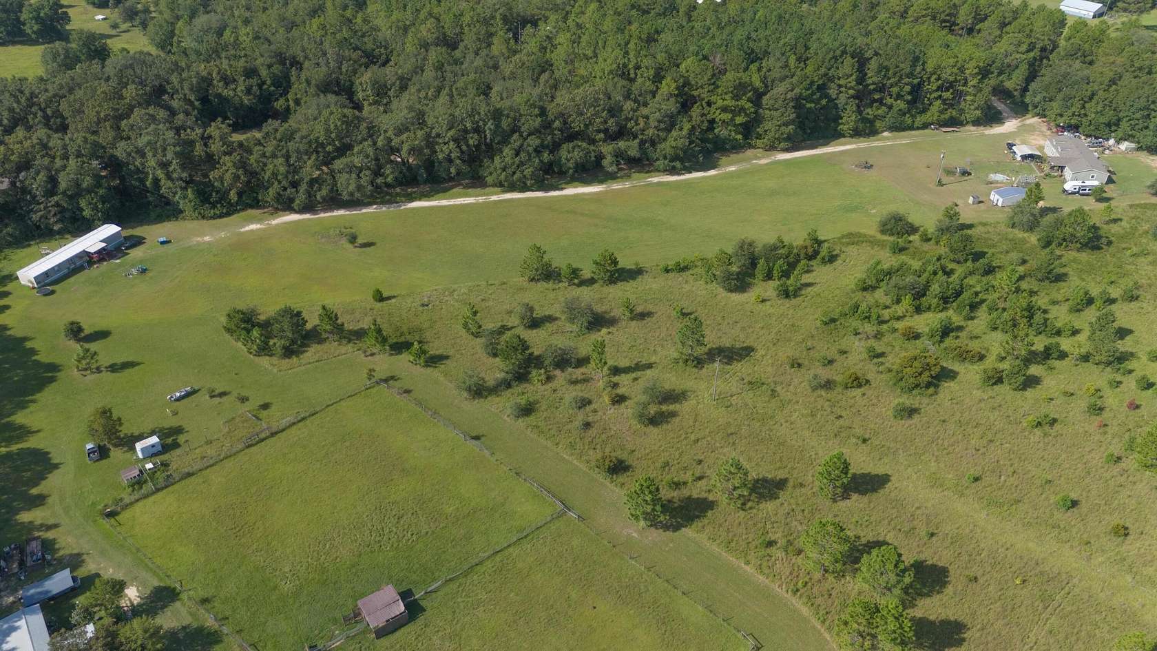 3.71 Acres of Residential Land with Home for Sale in Baker, Florida