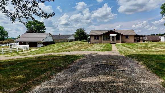 2.15 Acres of Residential Land with Home for Auction in Sugarcreek, Ohio