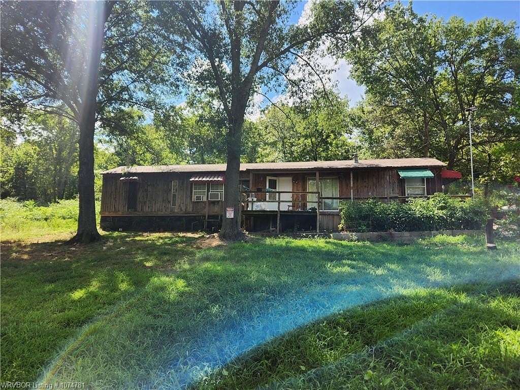 1.4 Acres of Residential Land with Home for Sale in Arkoma, Oklahoma