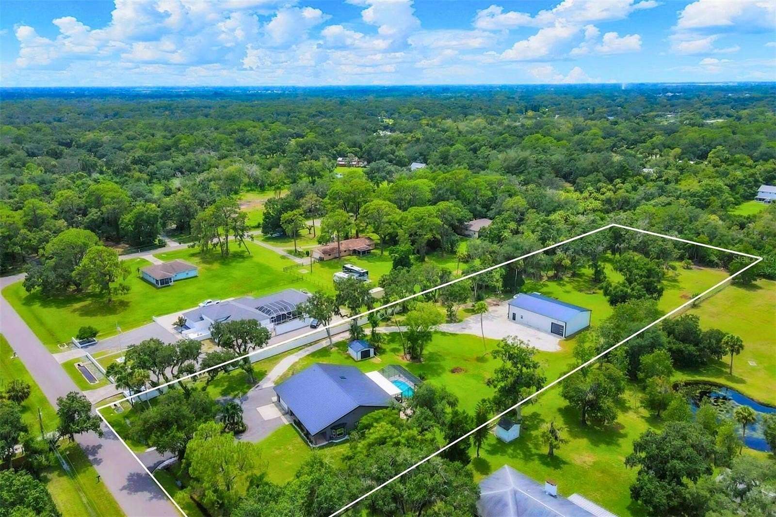 2.5 Acres of Residential Land with Home for Sale in Bradenton, Florida