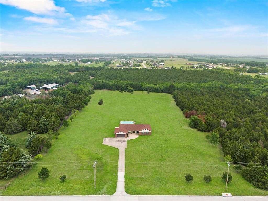 10 Acres of Residential Land with Home for Sale in Fate, Texas