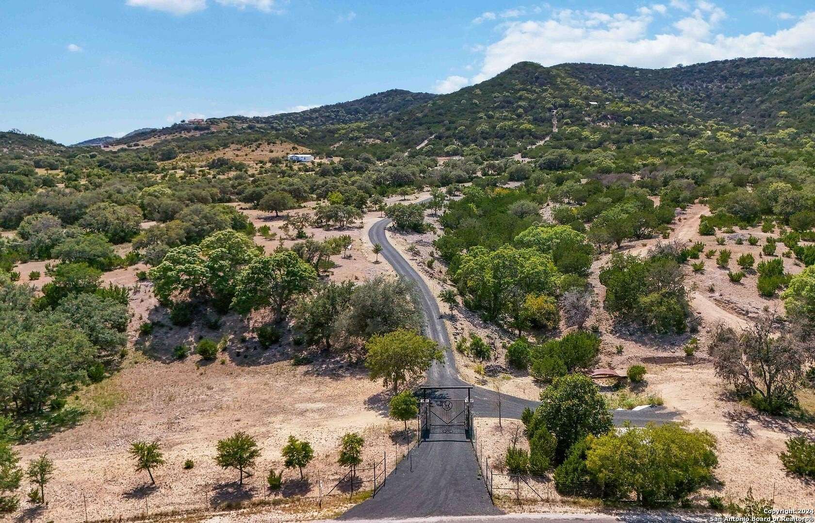124 Acres of Land with Home for Sale in Vanderpool, Texas
