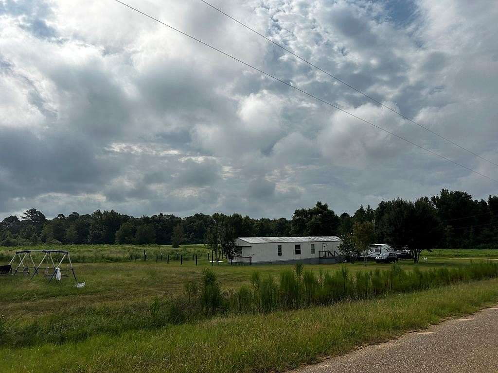 11.47 Acres of Land with Home for Sale in Ashford, Alabama