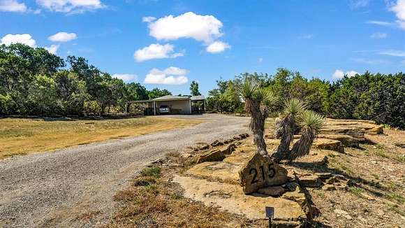 2.566 Acres of Residential Land with Home for Sale in Mineral Wells, Texas