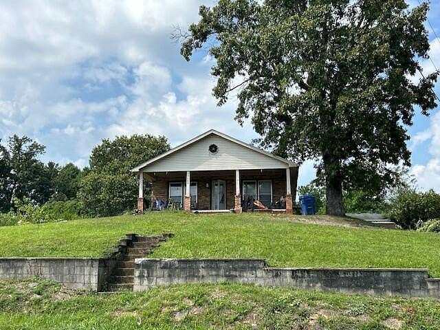 3.5 Acres of Residential Land with Home for Sale in Stearns, Kentucky