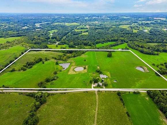 59 Acres of Recreational Land with Home for Sale in Polo, Missouri