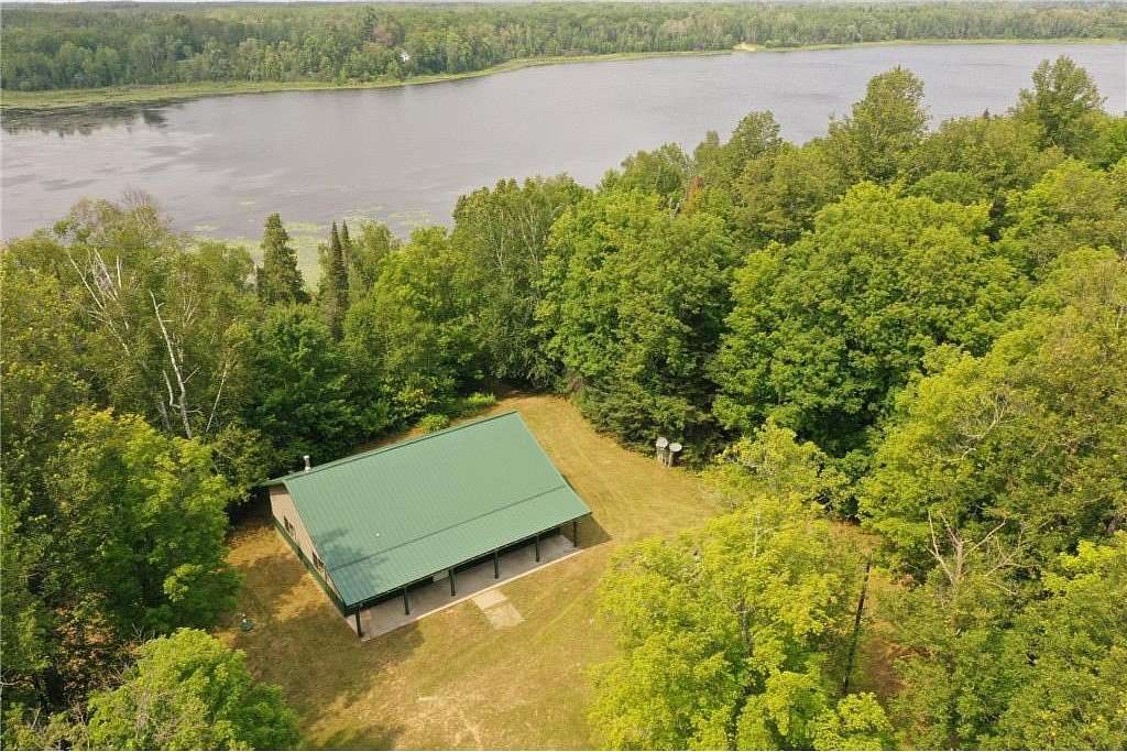 77.65 Acres of Land with Home for Sale in Hibbing, Minnesota