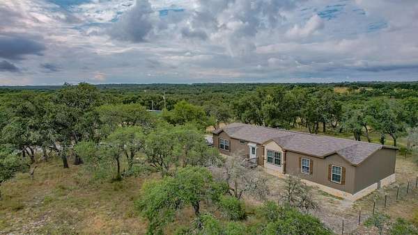 5 Acres of Residential Land with Home for Sale in Harper, Texas