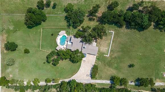 3.9 Acres of Residential Land with Home for Sale in Garland, Texas