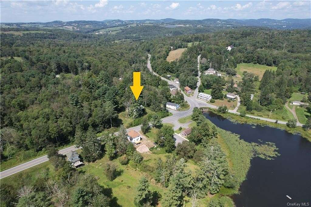 4.6 Acres of Residential Land with Home for Sale in Kenoza Lake, New York