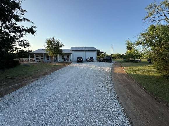 10 Acres of Residential Land with Home for Sale in Blum, Texas