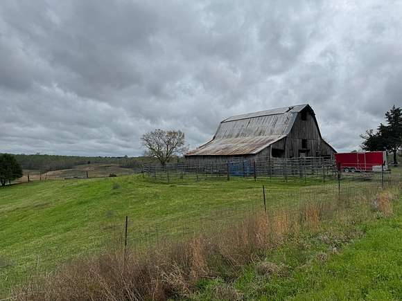 128 Acres of Land with Home for Sale in Toone, Tennessee