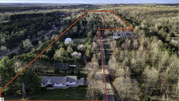 25.1 Acres of Land with Home for Sale in Traverse City, Michigan