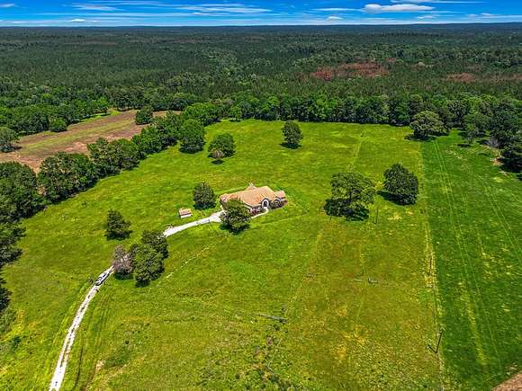 12 Acres of Recreational Land with Home for Sale in Huntsville, Texas