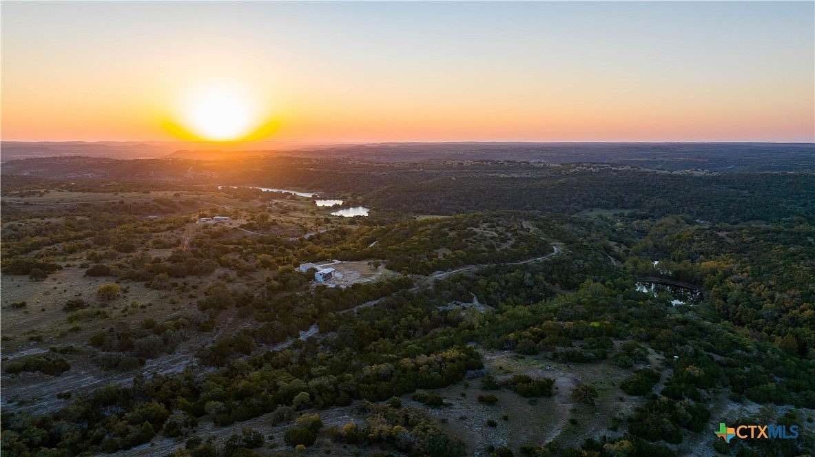 54 Acres of Agricultural Land with Home for Sale in Blanco, Texas