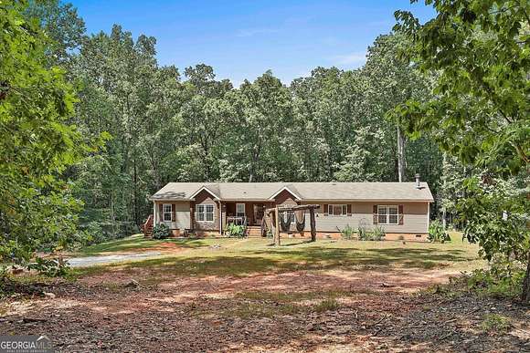 16.6 Acres of Recreational Land with Home for Sale in Roopville, Georgia