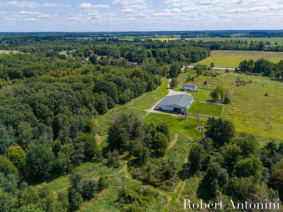 11.28 Acres of Land with Home for Sale in Cedar Springs, Michigan