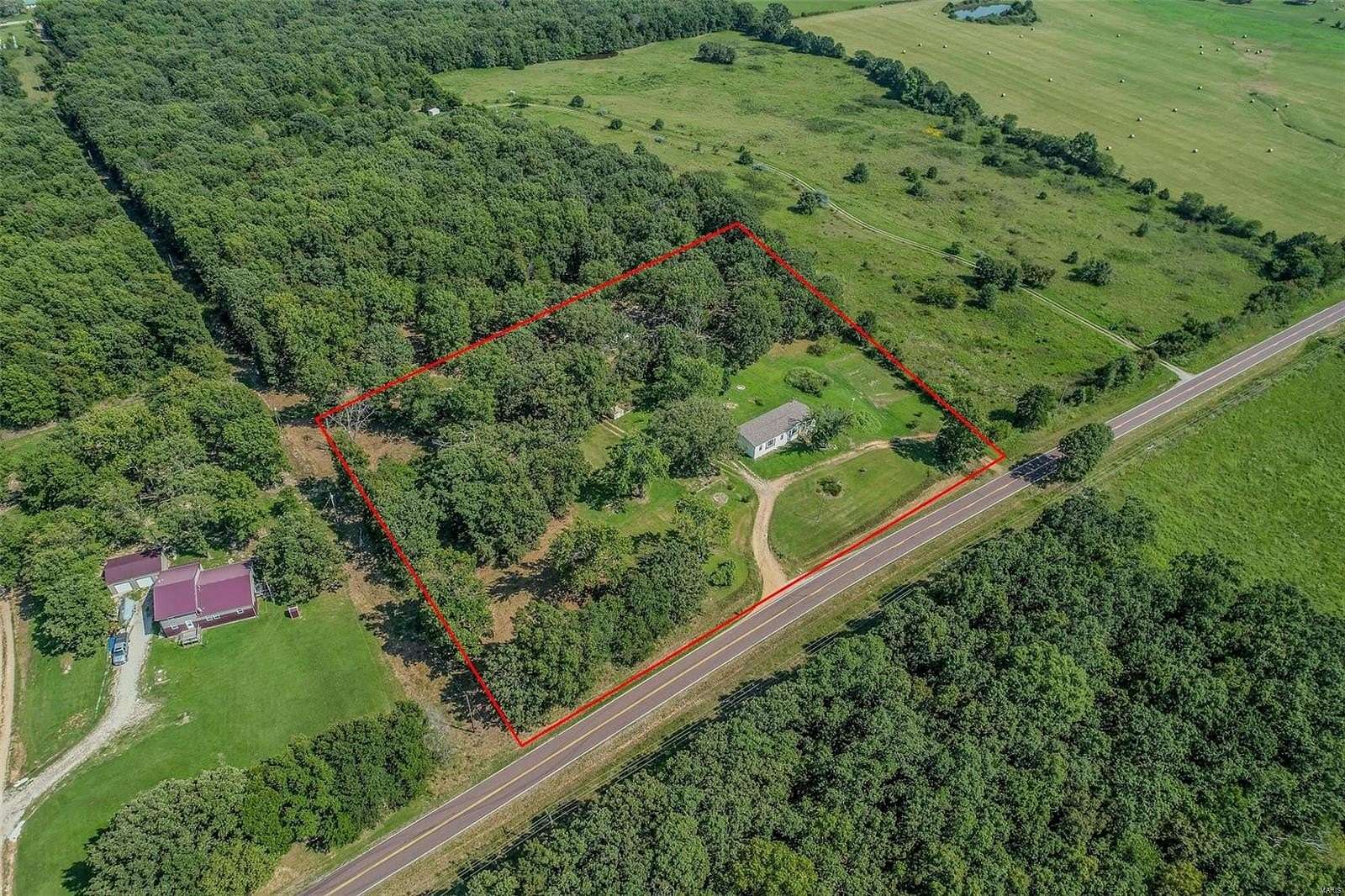 4.68 Acres of Residential Land with Home for Sale in Lebanon, Missouri