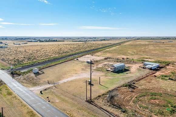 10.77 Acres of Land with Home for Sale in Canyon, Texas