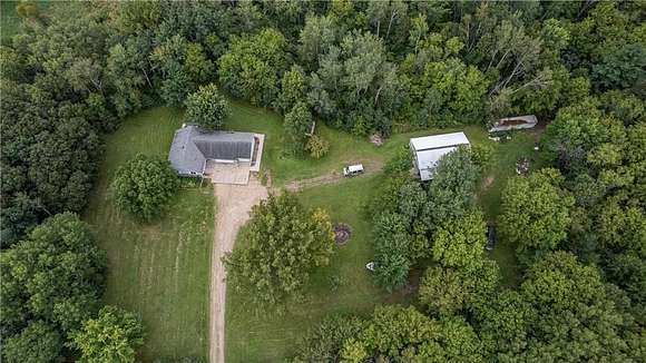 4.49 Acres of Residential Land with Home for Sale in Nowthen, Minnesota