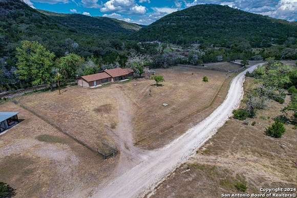 6.6 Acres of Residential Land with Home for Sale in Leakey, Texas