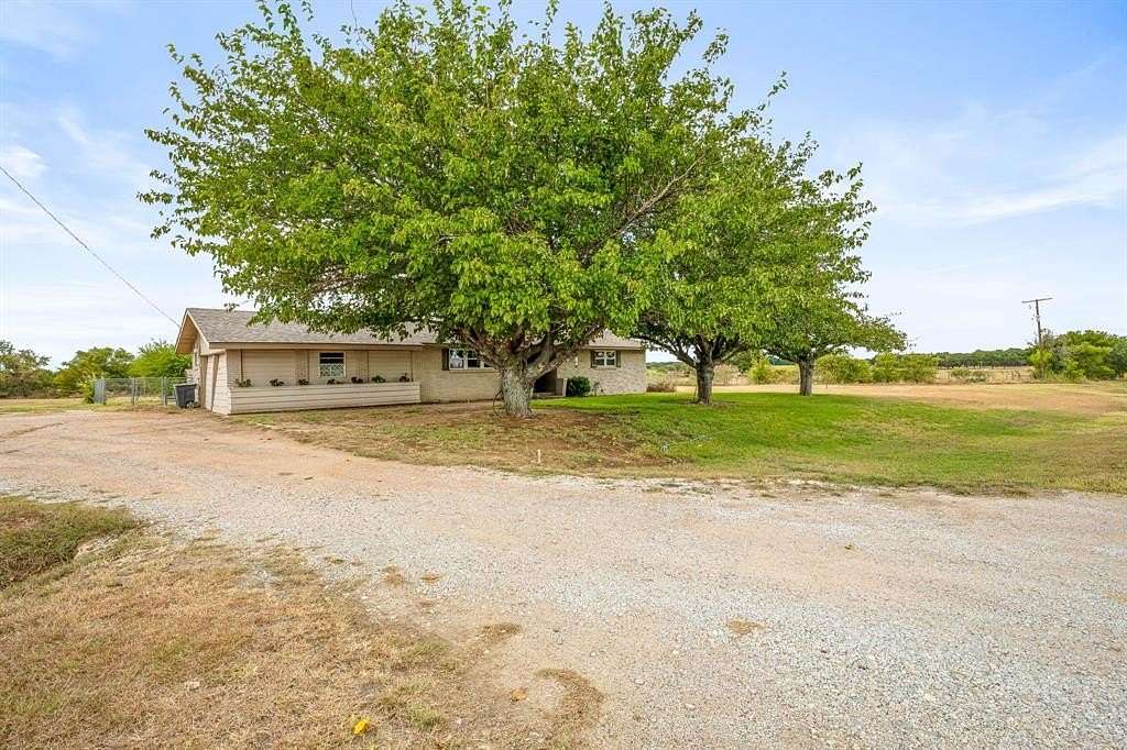 1.92 Acres of Residential Land with Home for Sale in De Leon, Texas