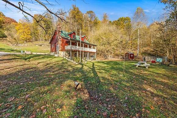 54.65 Acres of Agricultural Land with Home for Sale in Elmwood, Tennessee