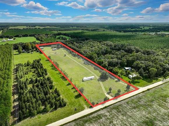 8 Acres of Residential Land with Home for Sale in Chiefland, Florida